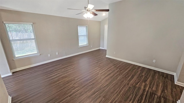7305 Moon Ridge Ct, Fort Worth, TX 76133 - empty room with a ceiling fan, baseboards, lofted ceiling, and dark wood-type flooring