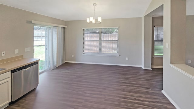 7305 Moon Ridge Ct, Fort Worth, TX 76133 - unfurnished dining area with a chandelier, dark wood-style floors, and baseboards