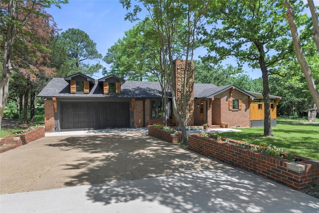 401 Tangle Dr, Tool, TX 75143 - view of front facade featuring driveway, brick siding, an attached garage, a front yard, and a chimney