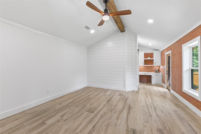 401 Tangle Dr, Tool, TX 75143 - unfurnished living room featuring brick wall, a ceiling fan, light wood finished floors, and baseboards