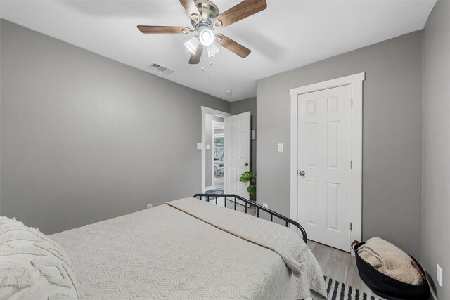 1900 N 15th St, Waco, TX 76707 - bedroom featuring wood finished floors and ceiling fan