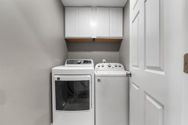 1900 N 15th St, Waco, TX 76707 - laundry area with washing machine and dryer and cabinet space