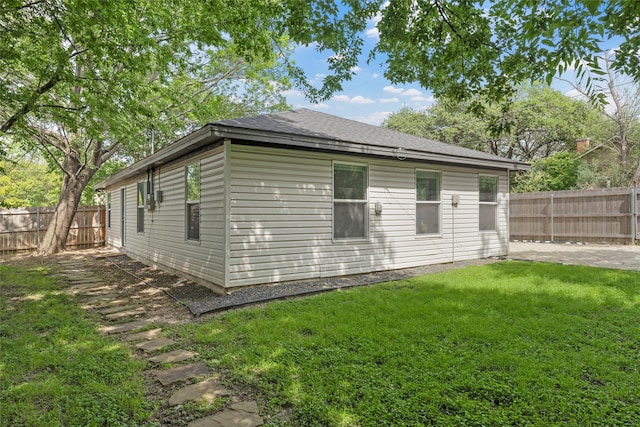 1900 N 15th St, Waco, TX 76707 - view of side of property featuring roof with shingles