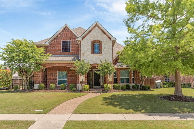1730 Monaco Dr, Allen, TX 75002 - view of front of house featuring stone siding, roof with shingles, and brick siding