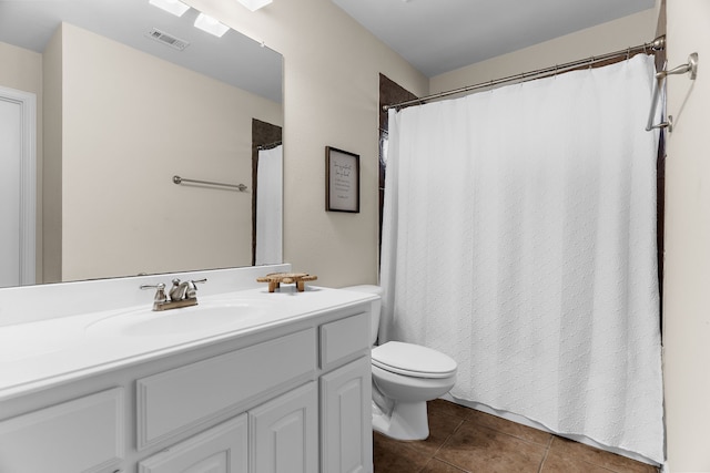 1730 Monaco Dr, Allen, TX 75002 - full bathroom featuring tile patterned floors, toilet, and vanity