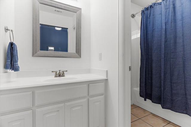 1730 Monaco Dr, Allen, TX 75002 - full bathroom with tile patterned flooring, vanity, and shower / bath combination with curtain