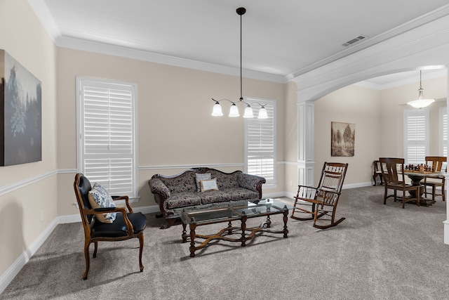 1730 Monaco Dr, Allen, TX 75002 - carpeted living area with crown molding, arched walkways, and baseboards
