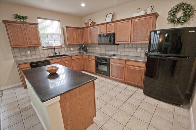 908 Reveille Rd, Fort Worth, TX 76108 - kitchen with black appliances, a sink, backsplash, light tile patterned flooring, and a center island