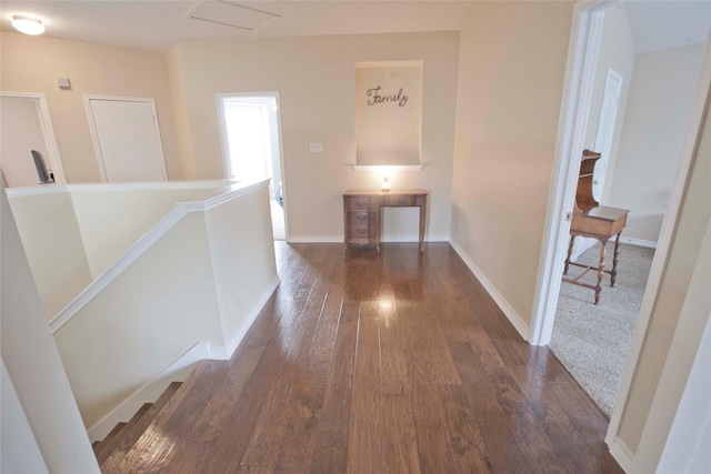 908 Reveille Rd, Fort Worth, TX 76108 - hallway featuring dark wood-style floors, an upstairs landing, and baseboards