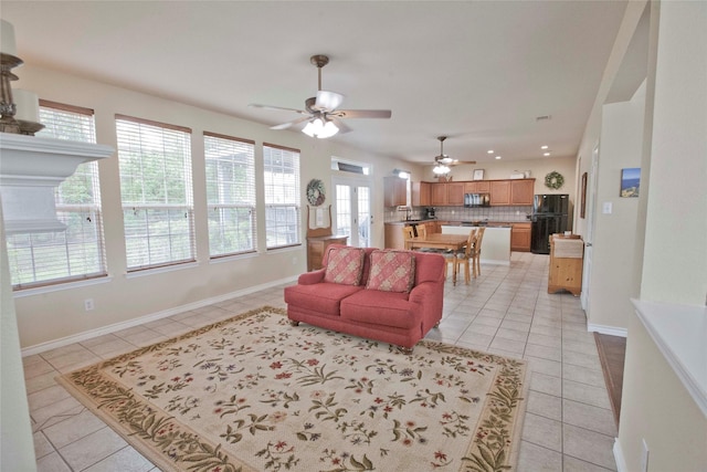 908 Reveille Rd, Fort Worth, TX 76108 - living area with light tile patterned floors, ceiling fan, baseboards, recessed lighting, and french doors