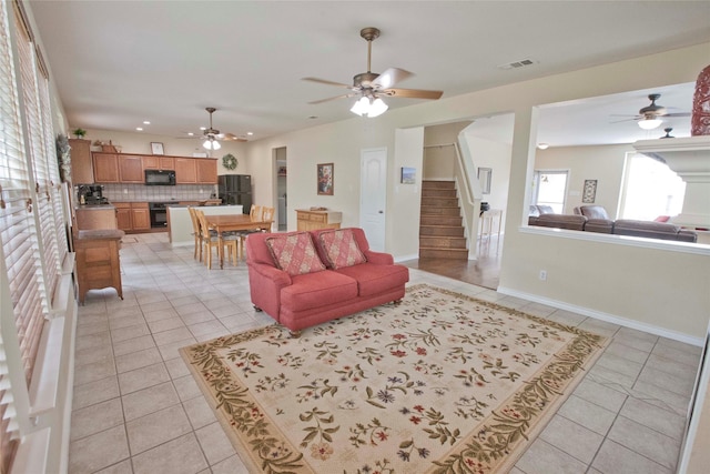 908 Reveille Rd, Fort Worth, TX 76108 - living area featuring a ceiling fan, light tile patterned flooring, stairway, recessed lighting, and baseboards