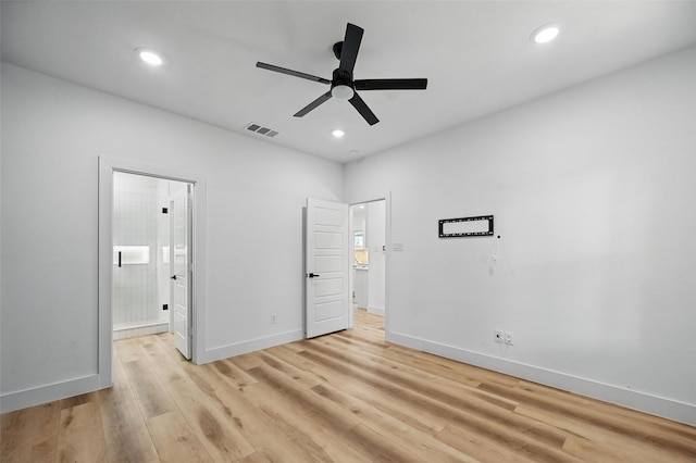 2927 Valentine St, Dallas, TX 75215 - unfurnished bedroom with light wood-style flooring, recessed lighting, baseboards, connected bathroom, and a ceiling fan