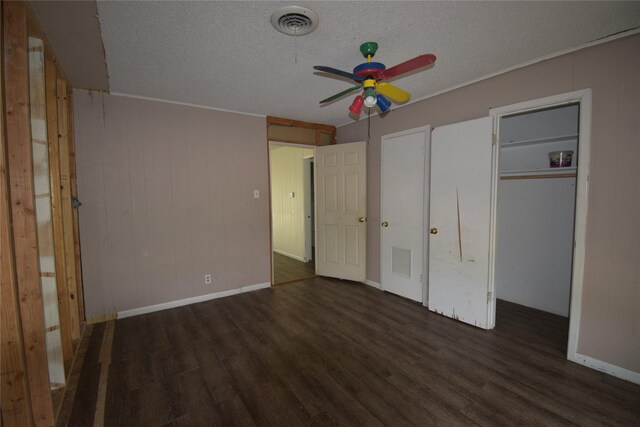 112 Big Bass Rd, West, TX 76691 - unfurnished bedroom with wood finished floors, baseboards, and a textured ceiling