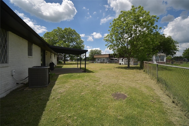 112 Big Bass Rd, West, TX 76691 - view of yard with central AC and a patio area