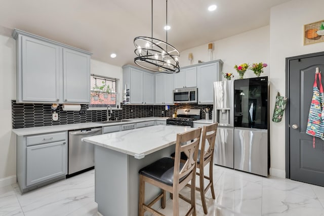2775 Sweetbriar Ln, Grand Prairie, TX 75052 - kitchen with stainless steel appliances, a sink, light marble finish floors, decorative backsplash, and a kitchen island