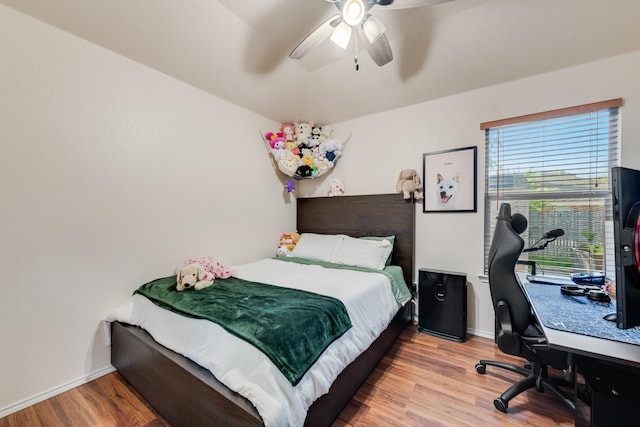 2775 Sweetbriar Ln, Grand Prairie, TX 75052 - bedroom featuring wood finished floors, baseboards, a desk, and ceiling fan