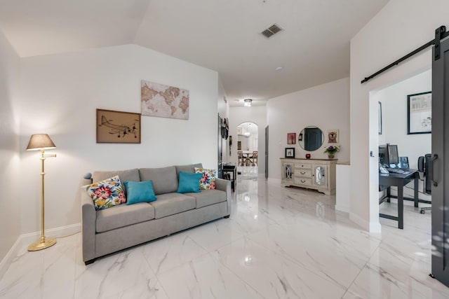 2775 Sweetbriar Ln, Grand Prairie, TX 75052 - living area featuring a barn door, light marble finish floors, arched walkways, baseboards, and lofted ceiling