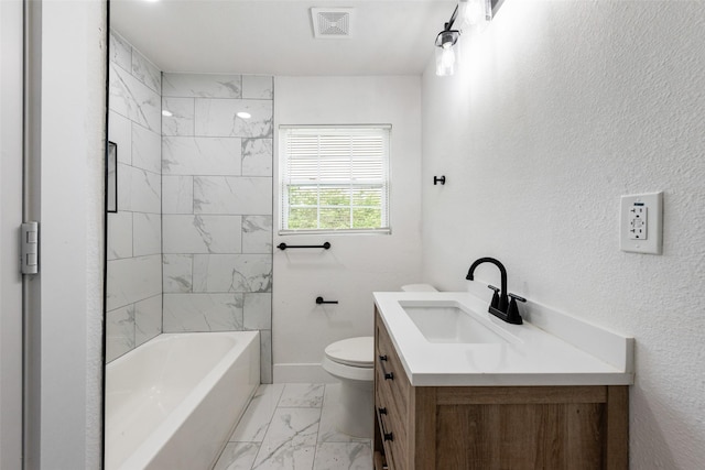 4320 Carmel Ave, Fort Worth, TX 76119 - full bathroom featuring marble finish floors, toilet, vanity, baseboards, and tub / shower combination