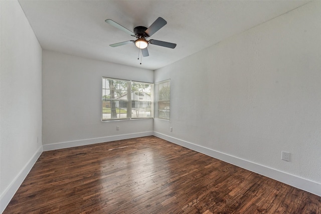 4320 Carmel Ave, Fort Worth, TX 76119 - unfurnished room with dark wood finished floors, ceiling fan, and baseboards