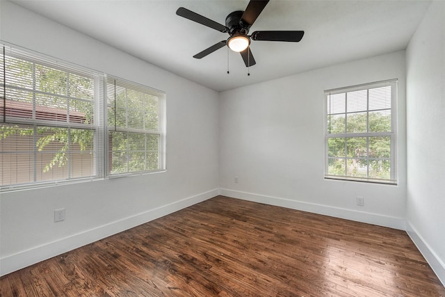 4320 Carmel Ave, Fort Worth, TX 76119 - unfurnished room featuring baseboards, dark wood-style floors, and a ceiling fan