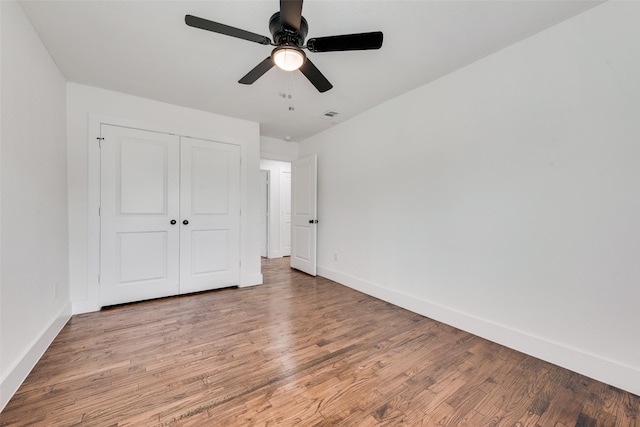 4320 Carmel Ave, Fort Worth, TX 76119 - unfurnished bedroom featuring baseboards, light wood-style floors, a closet, and a ceiling fan