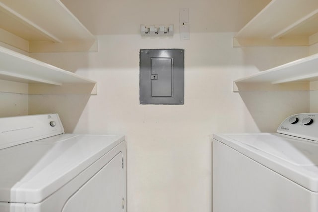 18333 Roehampton Dr Unit 714, Dallas, TX 75252 - laundry room featuring washing machine and dryer and electric panel