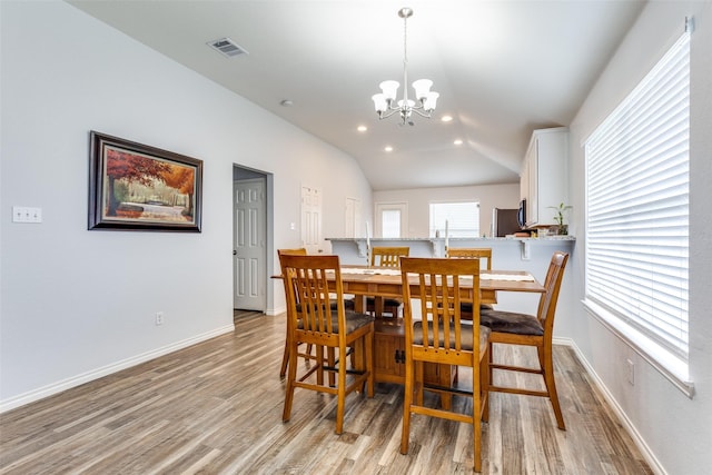 14320 Polo Ranch St, Fort Worth, TX 76052 - dining room with light wood-style floors, a chandelier, lofted ceiling, baseboards, and recessed lighting