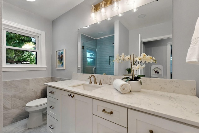 6042 Belgrade Ave, Dallas, TX 75227 - full bathroom featuring a shower stall, tile walls, toilet, vanity, and marble finish flooring