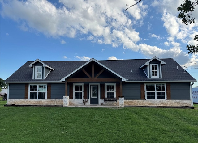 1668 Poe Prairie Rd, Millsap, TX 76066 - craftsman house featuring stone siding, a front yard, and roof with shingles