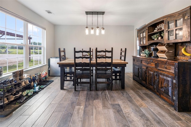1668 Poe Prairie Rd, Millsap, TX 76066 - dining room featuring dark wood-style flooring