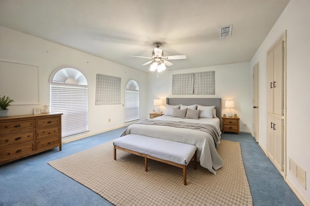 bedroom featuring carpet floors, ceiling fan, and baseboards