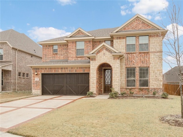 4158 Kate Dr, Frisco, TX 75034 - view of front of home with a garage, concrete driveway, stone siding, a shingled roof, and brick siding