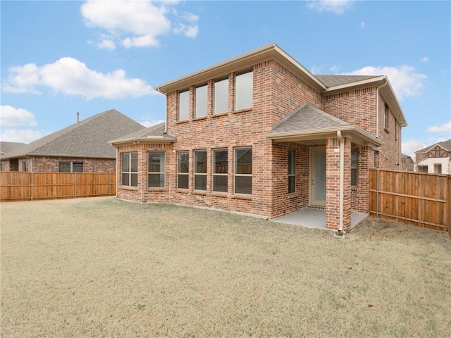 4158 Kate Dr, Frisco, TX 75034 - rear view of house with brick siding, a patio area, and a shingled roof