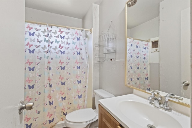 12015 Galva Dr, Dallas, TX 75243 - bathroom featuring toilet, vanity, and curtained shower