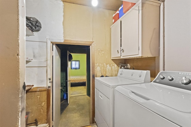 12015 Galva Dr, Dallas, TX 75243 - laundry area featuring cabinet space and independent washer and dryer
