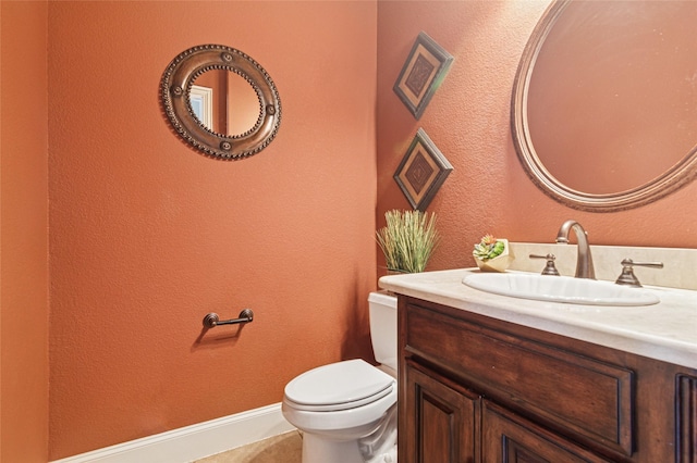 801 Shadow Hill Dr, Prosper, TX 75078 - half bathroom with toilet, vanity, baseboards, and a textured wall