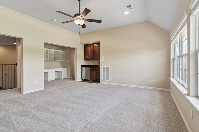 801 Shadow Hill Dr, Prosper, TX 75078 - unfurnished living room featuring a ceiling fan, lofted ceiling, light colored carpet, baseboards, and recessed lighting