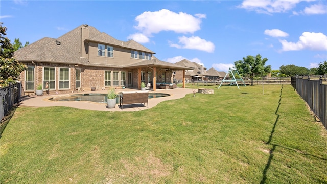 12046 Erin Ln, Fort Worth, TX 76179 - back of house with an outdoor hangout area, a patio area, brick siding, a playground, and roof with shingles
