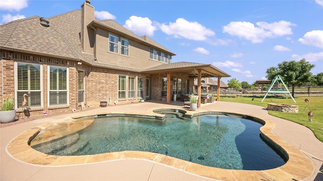 12046 Erin Ln, Fort Worth, TX 76179 - view of swimming pool with a patio area, a pool with connected hot tub, and a fire pit