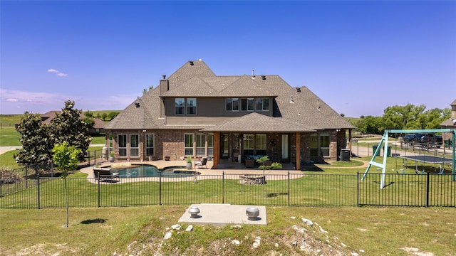 12046 Erin Ln, Fort Worth, TX 76179 - rear view of house with a patio area, brick siding, an outdoor living space, roof with shingles, and a playground