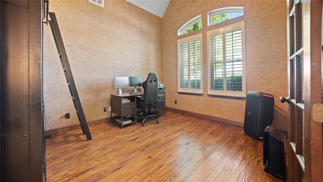 12046 Erin Ln, Fort Worth, TX 76179 - office area featuring wood finished floors, lofted ceiling, and baseboards