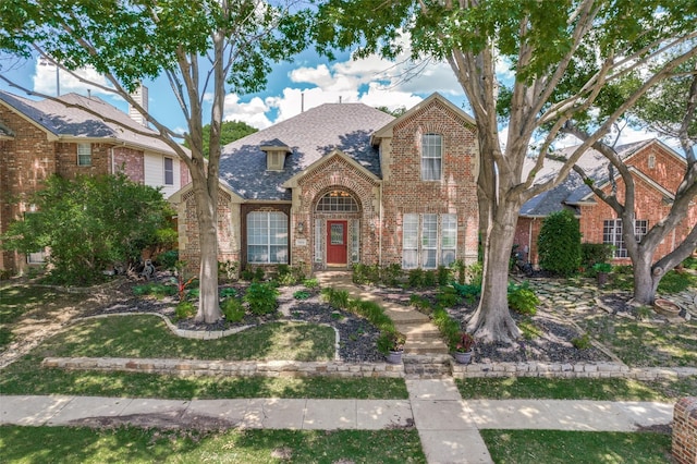 1414 Tulane Ct, Allen, TX 75013 - traditional-style house featuring brick siding and roof with shingles