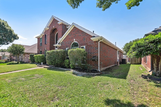 11003 Canoe Rd, Frisco, TX 75035 - view of side of home featuring brick siding and central AC