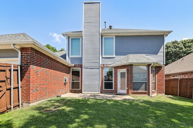 11003 Canoe Rd, Frisco, TX 75035 - rear view of property with brick siding, a chimney, and a patio