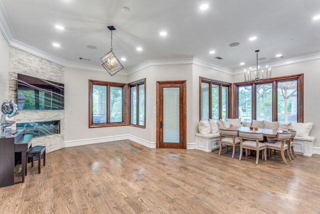 7212 John Mccain Rd, Colleyville, TX 76034 - dining space with crown molding, wood finished floors, recessed lighting, a chandelier, and baseboards
