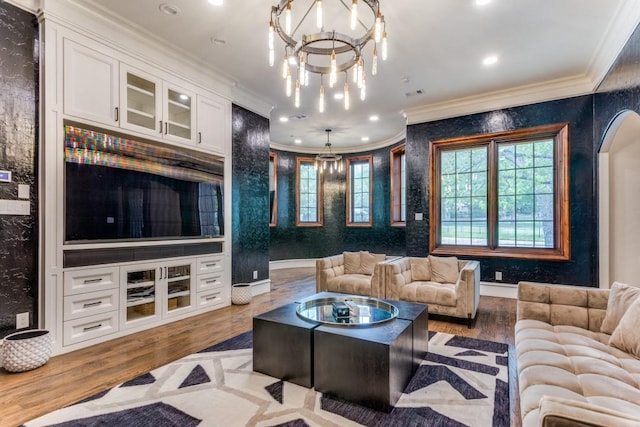 7212 John Mccain Rd, Colleyville, TX 76034 - living room with ornamental molding, a chandelier, healthy amount of natural light, wood finished floors, and recessed lighting