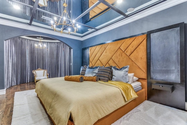 7212 John Mccain Rd, Colleyville, TX 76034 - bedroom with a chandelier, arched walkways, crown molding, and wood finished floors