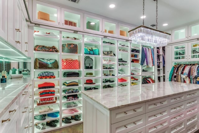 7212 John Mccain Rd, Colleyville, TX 76034 - spacious closet featuring wood finished floors