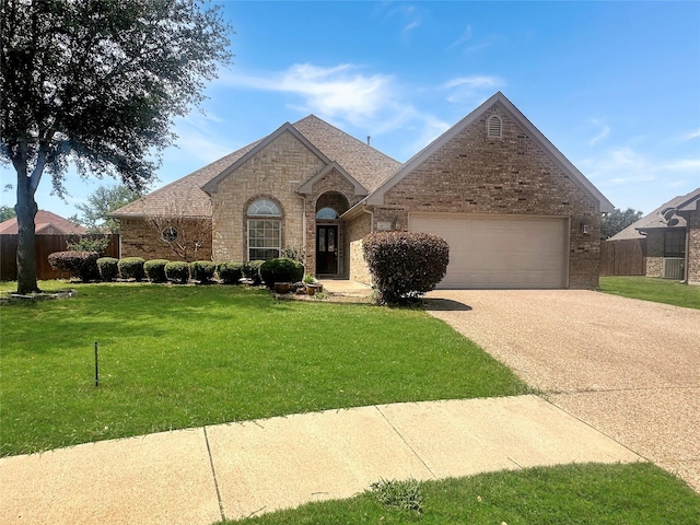 10717 Greenview Ct, Benbrook, TX 76126 - french country inspired facade featuring concrete driveway, brick siding, a garage, and stone siding