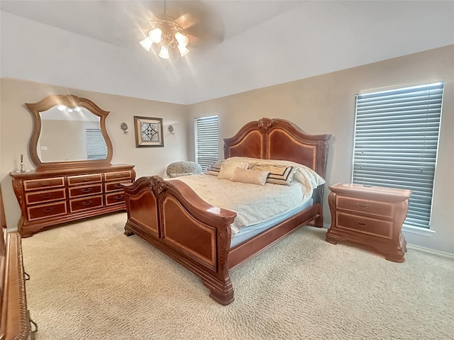 10717 Greenview Ct, Benbrook, TX 76126 - bedroom featuring light carpet, ceiling fan, vaulted ceiling, and baseboards